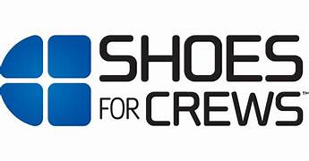 Shoes For Crews logo featuring four blue squares forming a larger square, with the brand name in bold black text to the right.